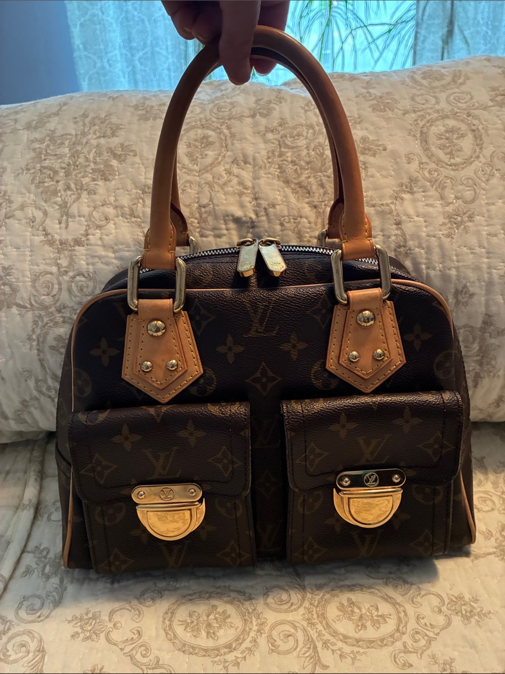 Authenticated Louis Vuitton Monogram Manhattan PM